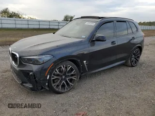 2022 BMW X5 M with VIN 5YMJU0C00N9K37599, listed as a Copart auction lot 83061804 with 0 mi miles and Salvage Title. Bid and sale history available at carsss.com. Image 1.