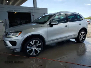 2017 Volkswagen Touareg Wolfsburg Edition с VIN WVGRF7BP9HD002130, выставлен на аукционе Copart как лот 53077735 с пробегом 84 482 миль миль и Чистый • Clean title. История ставок и продаж доступна на DreamBid. Изображение 1.