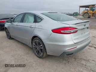 2019 Ford Fusion Titanium with VIN 3FA6P0D9XKR206465, listed as a IAAI auction lot 41577306 with 70,668 mi miles. Bid and sale history available at carsss.com. Image 3.