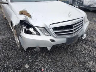 2012 Mercedes-Benz E-Class E 350 Luxury with VIN WDDHF5KB4CA618729, listed as a IAAI auction lot 41074382 with 115,060 mi miles. Bid and sale history available at carsss.com. Image 6.