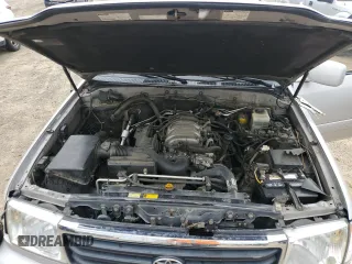 1999 Toyota Land Cruiser z VIN JT3HT05J9X0055914, wystawiony jako Copart lot #57261305 z przebiegiem 196 265 mil mil oraz Szkoda całkowita • Salvage title. Historia ofert i sprzedaży dostępna na DreamBid. Obrazek 12.