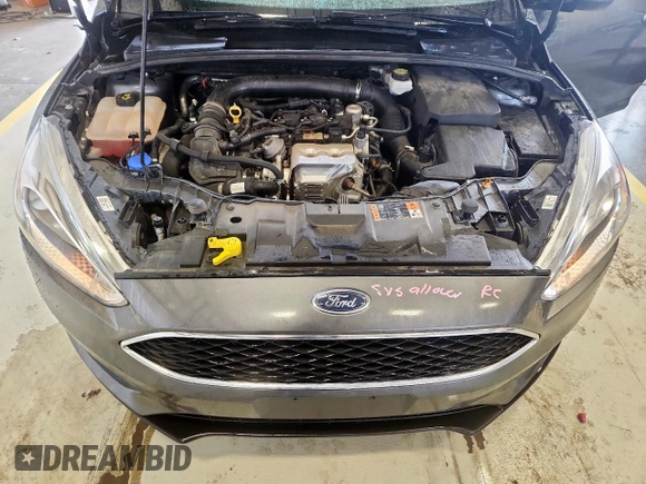2018 Ford Focus SE with VIN 1FADP3FE0JL311760, listed as a Copart auction lot 63621755 with 81,000 mi miles and Salvage title. Bid and sale history available at DreamBid. Image 11.