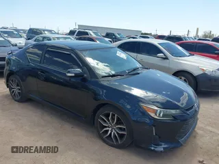 2015 Scion tC z VIN JTKJF5C74FJ003875, wystawiony jako IAAI lot #42184426 z przebiegiem 81 248 mil mil oraz . Historia ofert i sprzedaży dostępna na DreamBid. Obrazek 1.