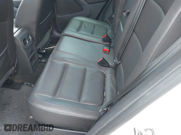 2012 Volkswagen Tiguan S with VIN WVGAV7AX0CW566151, listed as a IAAI auction lot 42826985 with 121,185 mi miles and . Bid and sale history available at DreamBid. Image 8.
