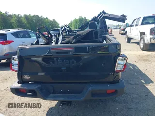 2023 Jeep Gladiator Sport S z VIN 1C6HJTAG2PL544870, wystawiony jako IAAI lot #42155013 z przebiegiem Nie podano mil oraz . Historia ofert i sprzedaży dostępna na DreamBid. Obrazek 16.