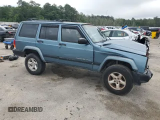 1999 Jeep Cherokee Sport с VIN 1J4FT68S9XL552299, выставлен на аукционе Copart как лот 58045135 с пробегом Не указан миль и Списание • Salvage title. История ставок и продаж доступна на DreamBid. Изображение 4.