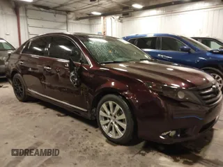 2011 Toyota Avalon with VIN 4T1BK3DB4BU433408, listed as a IAAI auction lot 40596175 with 123,529 mi miles and . Bid and sale history available at carsss.com. Image 1.