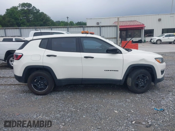 2019 Jeep Compass Sport z VIN 3C4NJCAB7KT646551, wystawiony jako IAAI lot #42603669 z przebiegiem 73 110 mil mil oraz . Historia ofert i sprzedaży dostępna na DreamBid. Obrazek 13.