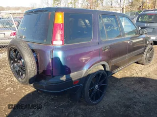 1998 Honda CR-V LX with VIN JHLRD1848WC105307, listed as a IAAI auction lot 41680033 with 17,296 mi miles. Bid and sale history available at carsss.com. Image 4.