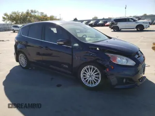 2016 Ford C-Max Energi SEL with VIN 1FADP5CU8GL114965, listed as a Copart auction lot 77697363 with 87,085 mi miles. Bid and sale history available at carsss.com. Image 4.
