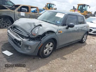 2015 MINI Hardtop 4 Door with VIN WMWXS5C56FT830418, listed as a IAAI auction lot 42132285 with 111,428 mi miles and . Bid and sale history available at DreamBid. Image 17.