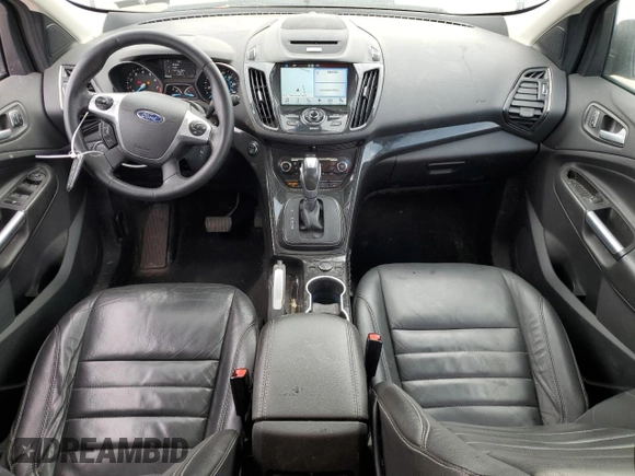 2016 Ford Escape Titanium with VIN 1FMCU9J95GUC17688, listed as a Copart auction lot 53234575 with 124,030 mi miles and Salvage Title. Bid and sale history available at DreamBid. Image 8.