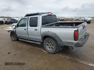 2002 Nissan Frontier SE with VIN 1N6ED27T92C379360, listed as a Copart auction lot 51235495 with 230,598 mi miles and Salvage title. Bid and sale history available at DreamBid. Image 2.