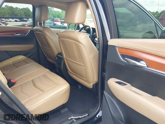 2017 Cadillac XT5 Platinum AWD z VIN 1GYKNFRS9HZ125677, wystawiony jako IAAI lot #42366784 z przebiegiem 152 116 mil mil oraz . Historia ofert i sprzedaży dostępna na DreamBid. Obrazek 8.