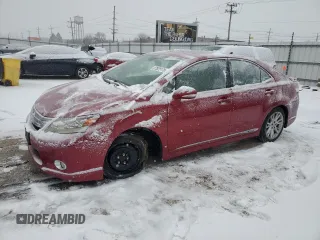 2010 Lexus HS 250h with VIN JTHBB1BA9A2005121, listed as a Copart auction lot 87825175 with 124,594 mi miles and Salvage Title. Bid and sale history available at DreamBid. Image 1.