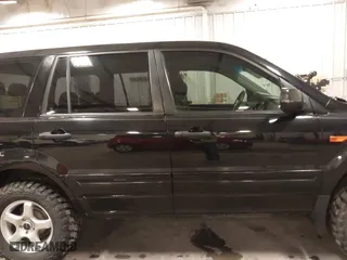 2007 Honda Pilot LX with VIN 5FNYF18117B009290, listed as a IAAI auction lot 41205310 with 150,081 mi miles. Bid and sale history available at carsss.com. Image 14.