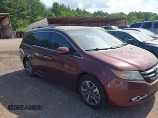 2016 Honda Odyssey Touring Elite z VIN 5FNRL5H93GB097513, wystawiony jako IAAI lot #42379462 z przebiegiem 223 884 mil mil oraz . Historia ofert i sprzedaży dostępna na DreamBid. Obrazek 1.
