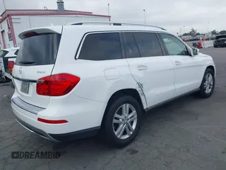 2014 Mercedes-Benz GL 450 z VIN 4JGDF7CE0EA424081, wystawiony jako IAAI lot #42359465 z przebiegiem 145 363 mil mil oraz . Historia ofert i sprzedaży dostępna na DreamBid. Obrazek 4.