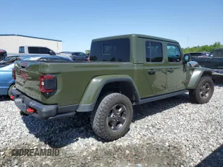 2022 Jeep Gladiator Rubicon с VIN 1C6JJTBGXNL130958, выставлен на аукционе Copart как лот 52515165 с пробегом 62 152 миль миль и Списание • Salvage title. История ставок и продаж доступна на DreamBid. Изображение 3.