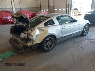 2011 Ford Mustang V6 with VIN 1ZVBP8AM9B5106521, listed as a IAAI auction lot 42041970 with 220,108 mi miles and . Bid and sale history available at DreamBid. Image 4.