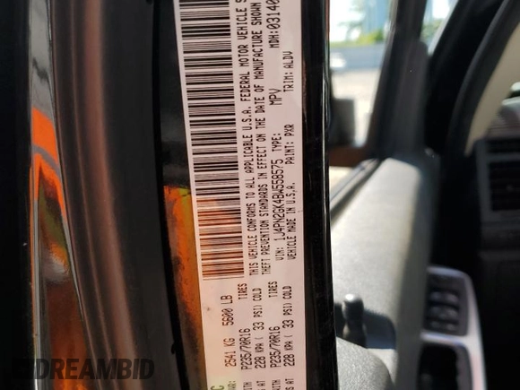 2011 Jeep Liberty Sport Jet z VIN 1J4PN2GK4BW558575, wystawiony jako Copart lot #55954565 z przebiegiem Nie podano mil oraz Szkoda całkowita • Salvage title. Historia ofert i sprzedaży dostępna na DreamBid. Obrazek 13.