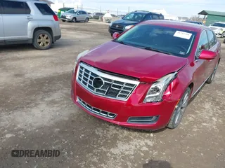 2013 Cadillac XTS z VIN 2G61N5S37D9177217, wystawiony jako IAAI lot #41747566 z przebiegiem 140 946 mil mil oraz . Historia ofert i sprzedaży dostępna na DreamBid. Obrazek 6.