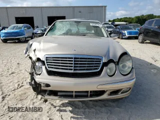 2005 Mercedes-Benz E 500 with VIN WDBUF70J35A696614, listed as a Copart auction lot 54342725 with 147,556 mi miles and Salvage Title. Bid and sale history available at DreamBid. Image 5.