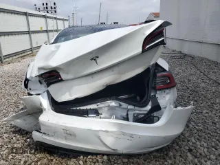 2019 Tesla Model 3 Mid Range with VIN 5YJ3E1EA6KF401661, listed as a Copart auction lot 54421225 with Not Provided miles and Clean Title. Bid and sale history available at DreamBid. Image 6.