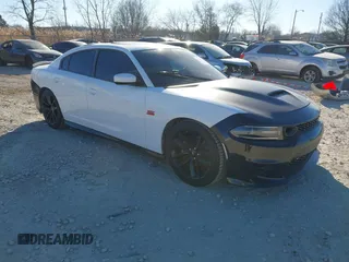 2021 Dodge Charger Scat Pack with VIN 2C3CDXGJ3MH595389, listed as a IAAI auction lot 41435842 with 8,663 mi miles and . Bid and sale history available at DreamBid. Image 1.