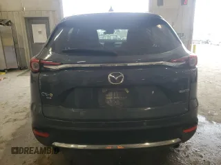 2021 Mazda CX-9 Grand Touring z VIN JM3TCBDYXM0516394, wystawiony jako Copart lot #52505215 z przebiegiem Nie podano mil oraz Szkoda całkowita • Salvage title. Historia ofert i sprzedaży dostępna na DreamBid. Obrazek 6.
