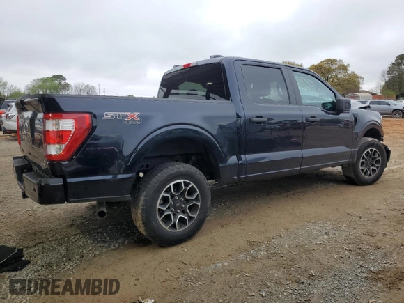 2023 Ford F-150 XL with VIN 1FTEW1EP5PKF67674, listed as a Copart auction lot 50348795 with 23,176 mi miles and Salvage title. Bid and sale history available at DreamBid. Image 3.
