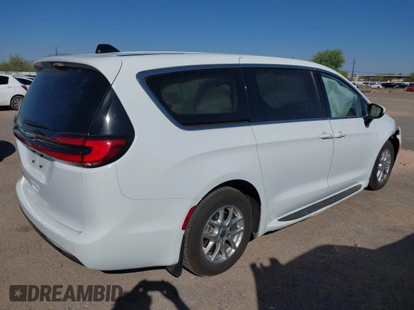 2023 Chrysler Pacifica Touring L with VIN 2C4RC1BG6PR531640, listed as a IAAI auction lot 42251680 with 31,638 mi miles and . Bid and sale history available at DreamBid. Image 4.
