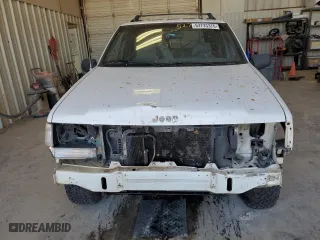 1995 Jeep Grand Cherokee Laredo with VIN 1J4GZ58Y0SC572757, listed as a Copart auction lot 52733375 with 160,588 mi miles and Salvage Title. Bid and sale history available at carsss.com. Image 5.