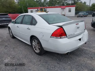 2013 Chevrolet Impala LTZ with VIN 2G1WC5E39D1202260, listed as a IAAI auction lot 41908155 with 210,193 mi miles and . Bid and sale history available at DreamBid. Image 3.