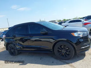 2023 Ford Edge SE z VIN 2FMPK4G90PBA05532, wystawiony jako IAAI lot #41845991 z przebiegiem 39 568 mil mil oraz . Historia ofert i sprzedaży dostępna na DreamBid. Obrazek 13.