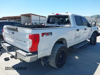 2021 Ford Super Duty F-250 SRW XL with VIN 1FT7W2BT3MEC30933, listed as a IAAI auction lot 41836915 with 100,089 mi miles. Bid and sale history available at carsss.com. Image 4.
