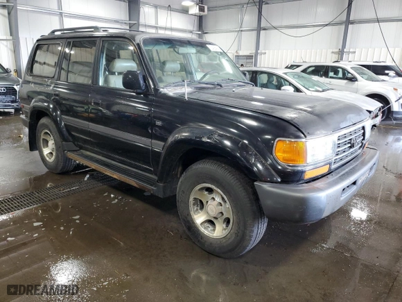 1997 Toyota Land Cruiser with VIN JT3HJ85J0V0184304, listed as a Copart auction lot 72438414 with 310,213 mi miles and Clean Title. Bid and sale history available at carsss.com. Image 4.