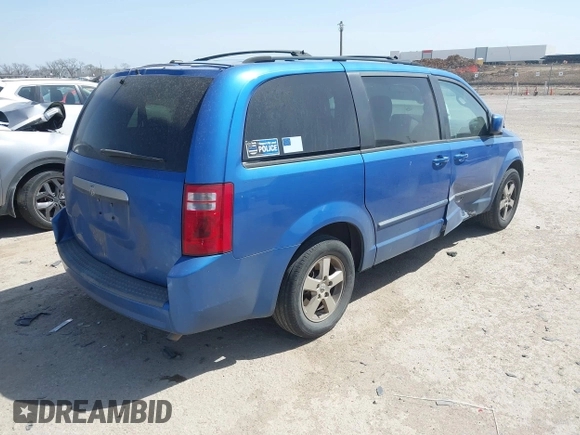 2008 Dodge Grand Caravan SXT with VIN 2D8HN54P18R795149, listed as a IAAI auction lot 41828264 with 144,432 mi miles and . Bid and sale history available at DreamBid. Image 4.