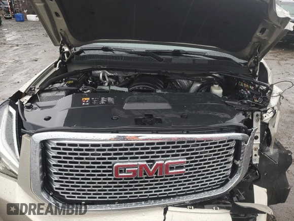 2015 GMC Yukon Denali with VIN 1GKS2CKJ3FR592707, listed as a Copart auction lot 47581575 with 121,326 mi miles and Salvage Title. Bid and sale history available at carsss.com. Image 12.