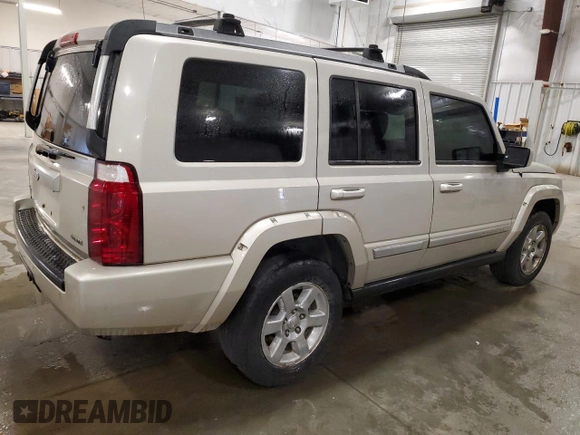 2007 Jeep Commander Overland z VIN 1J8HG68237C610869, wystawiony jako Copart lot #59824675 z przebiegiem 229 092 mil mil oraz Szkoda całkowita • Salvage title. Historia ofert i sprzedaży dostępna na DreamBid. Obrazek 3.