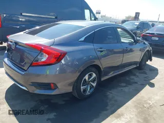 2020 Honda Civic LX with VIN 2HGFC2F67LH551651, listed as a IAAI auction lot 41861966 with 205,619 mi miles and . Bid and sale history available at DreamBid. Image 4.