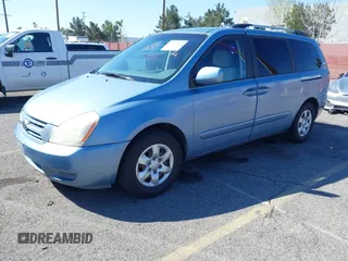 2009 Kia Sedona LX with VIN KNDMB233396300879, listed as a IAAI auction lot 41753122 with 183,754 mi miles. Bid and sale history available at carsss.com. Image 2.