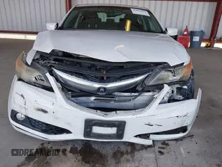 2014 Acura ILX Technology with VIN 19VDE1F73EE005200, listed as a IAAI auction lot 41854914 with 106,929 mi miles and . Bid and sale history available at DreamBid. Image 6.