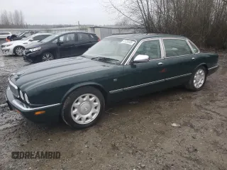 2000 Jaguar XJ with VIN SAJDA25BXYMF01667, listed as a Copart auction lot 41333495 with 102,291 mi miles and Clean Title. Bid and sale history available at DreamBid. Image 1.
