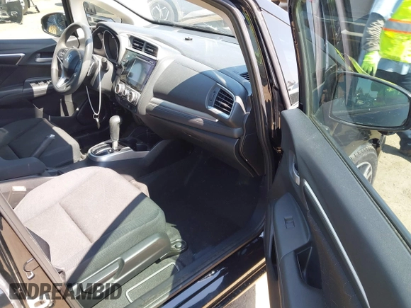 2015 Honda Fit EX-L z VIN 3HGGK5H85FM717646, wystawiony jako IAAI lot #42483387 z przebiegiem 137 296 mil mil oraz . Historia ofert i sprzedaży dostępna na DreamBid. Obrazek 5.