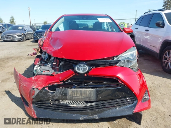 2018 Toyota Corolla L with VIN 2T1BURHE1JC066257, listed as a IAAI auction lot 42561467 with 80,064 mi miles and . Bid and sale history available at DreamBid. Image 12.