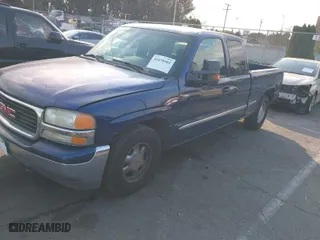 2002 GMC Sierra 1500 SLE with VIN 2GTEC19T521149253, listed as a IAAI auction lot 41470305 with 251,575 mi miles. Bid and sale history available at carsss.com. Image 2.