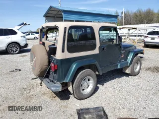 2001 Jeep Wrangler Sahara with VIN 1J4FA59S51P300953, listed as a Copart auction lot 51452505 with 157,642 mi miles and Clean Title. Bid and sale history available at carsss.com. Image 3.