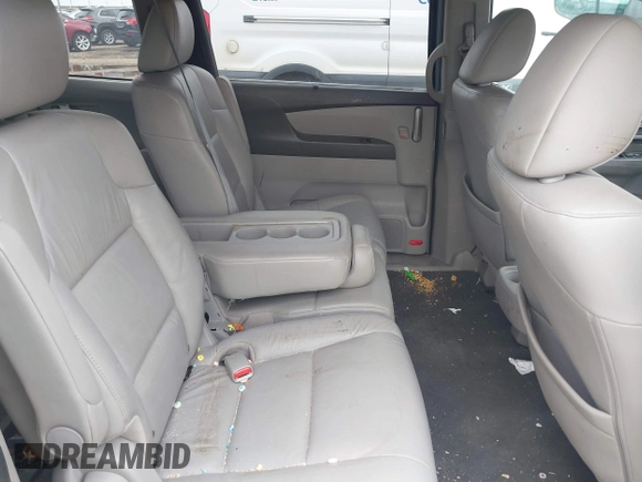 2011 Honda Odyssey EX-L with VIN 5FNRL5H64BB085479, listed as a IAAI auction lot 42404637 with 185,624 mi miles and . Bid and sale history available at DreamBid. Image 8.