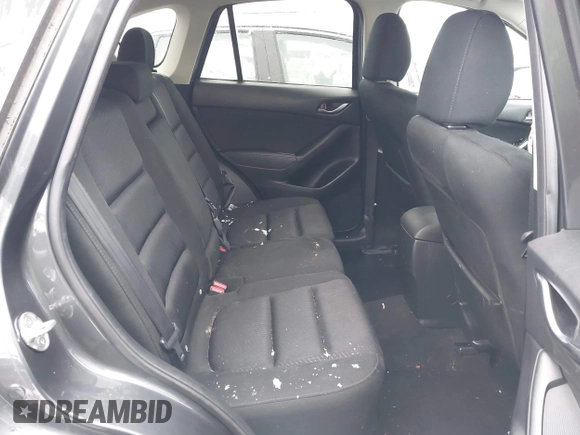 2014 Mazda CX-5 Touring with VIN JM3KE2CY2E0407453, listed as a IAAI auction lot 41564916 with 104,852 mi miles. Bid and sale history available at carsss.com. Image 8.